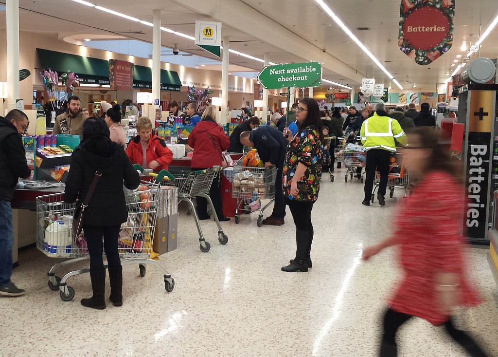 Christmas shoppers at Morrisons, King Lynn, Norfolk, UK