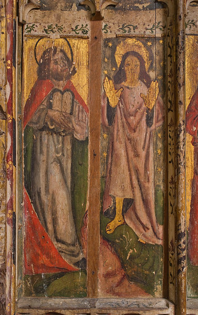 The rood screens and detail at St Andrew's Church, Westhall, Suffolk,UK. The screens are notable for their depiction of the Transfiguration of Christ, the only such surviving depiction in England.