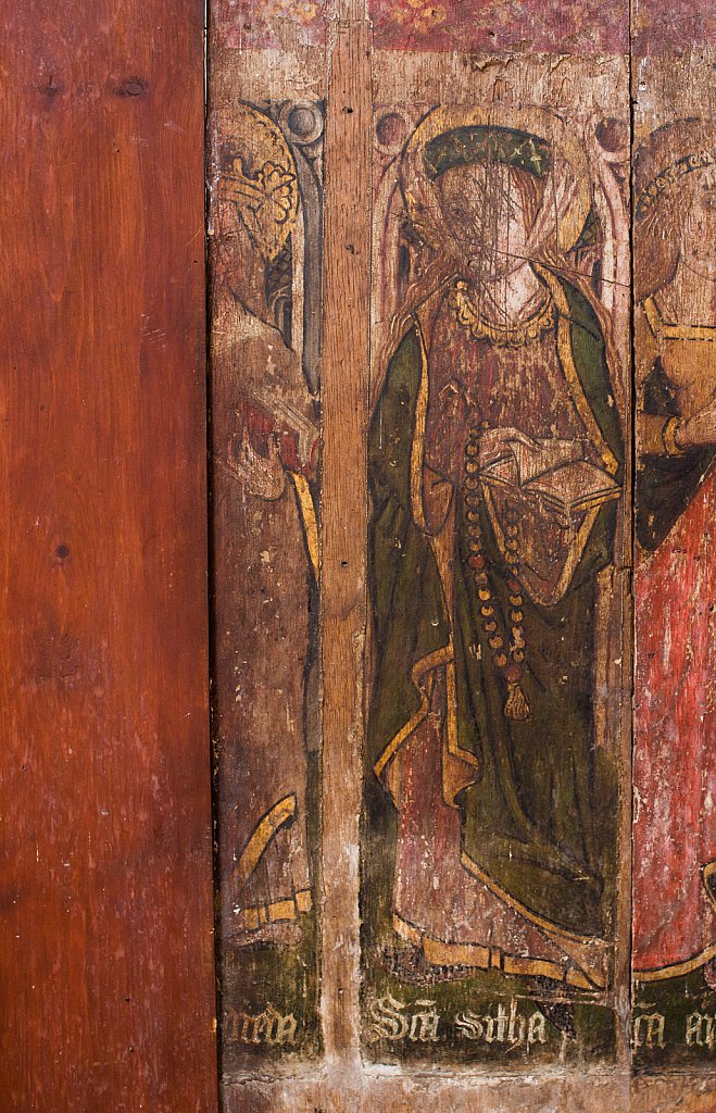 The rood screens and detail at St Andrew's Church, Westhall, Suffolk,UK. The screens are notable for their depiction of the Transfiguration of Christ, the only such surviving depiction in England.