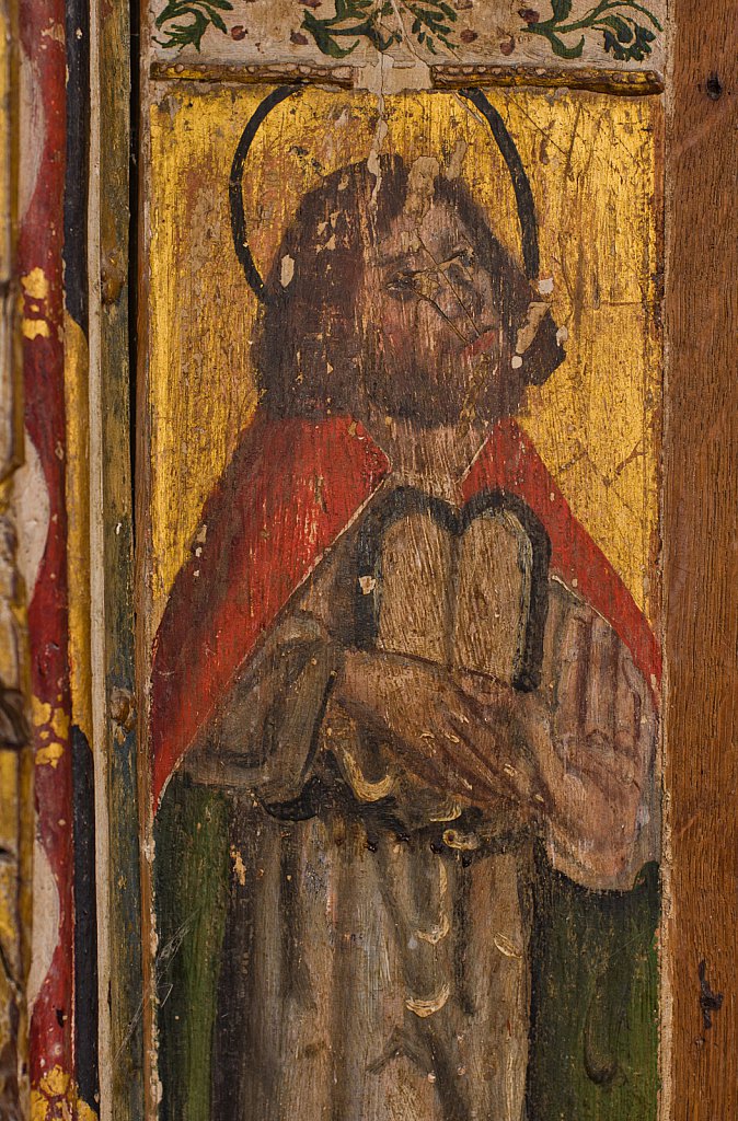 The rood screens and detail at St Andrew's Church, Westhall, Suffolk,UK. The screens are notable for their depiction of the Transfiguration of Christ, the only such surviving depiction in England.