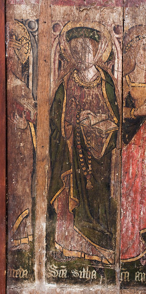 The rood screens and detail at St Andrew's Church, Westhall, Suffolk,UK. The screens are notable for their depiction of the Transfiguration of Christ, the only such surviving depiction in England.