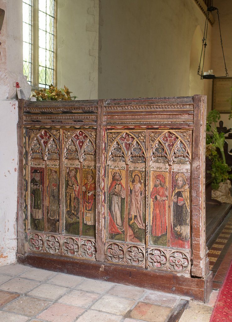 The rood screens and detail at St Andrew's Church, Westhall, Suffolk,UK. The screens are notable for their depiction of the Transfiguration of Christ, the only such surviving depiction in England.